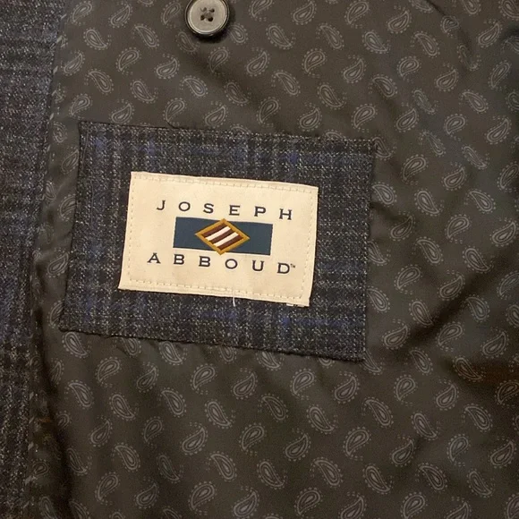 100% wool men’s wharehouse Joseph Abboud sports coat. Beautiful plaid detail.